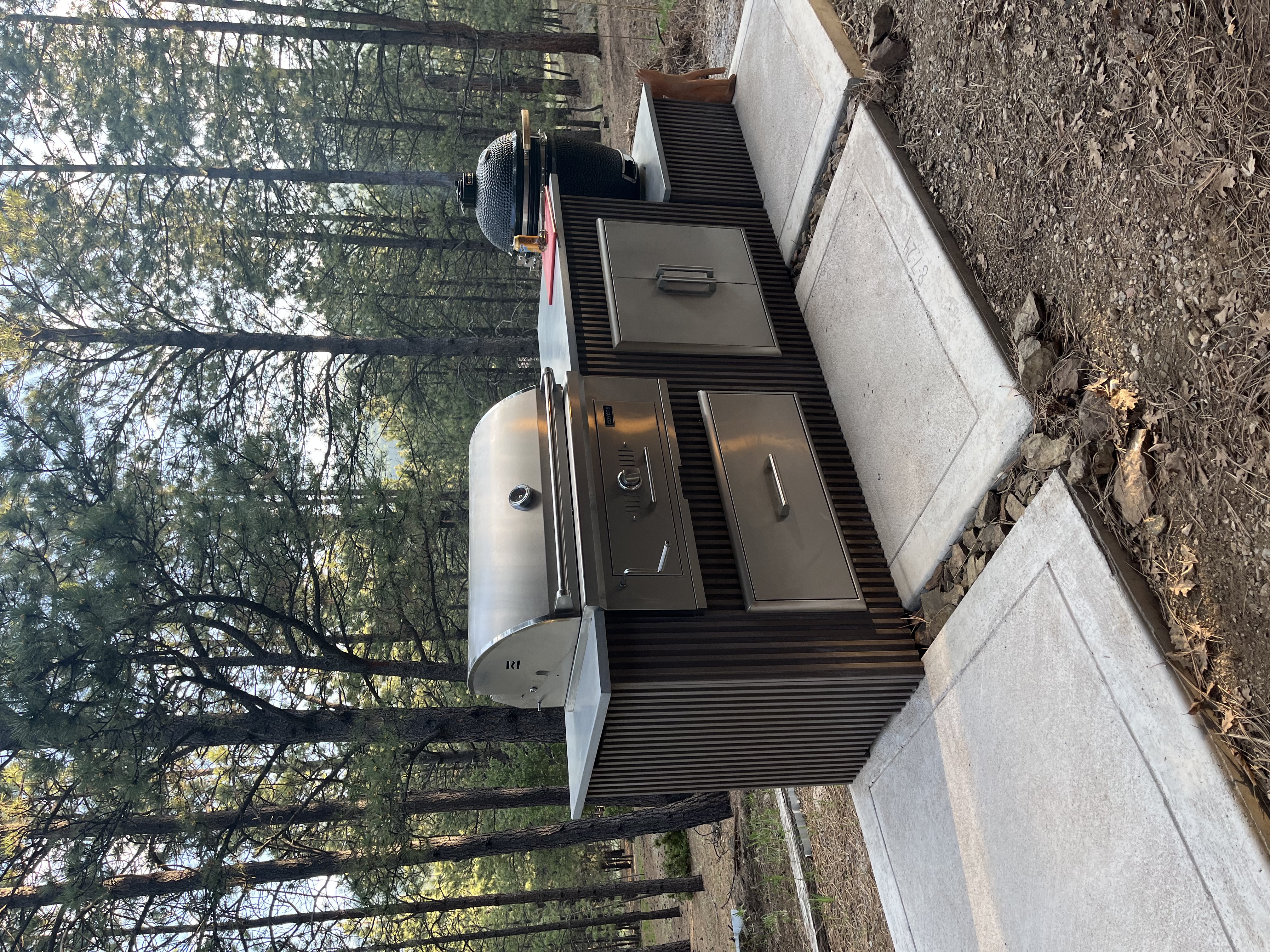 Forest retreat outdoor kitchen in evening light