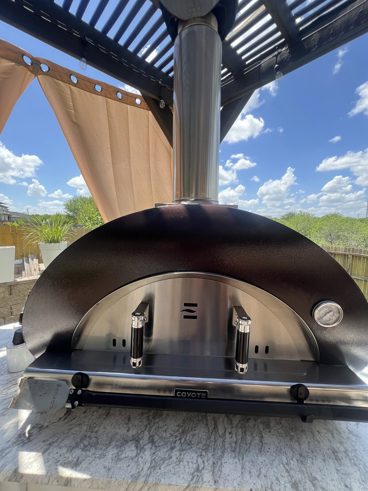 Coyote pizza oven detail, San Antonio outdoor kitchen