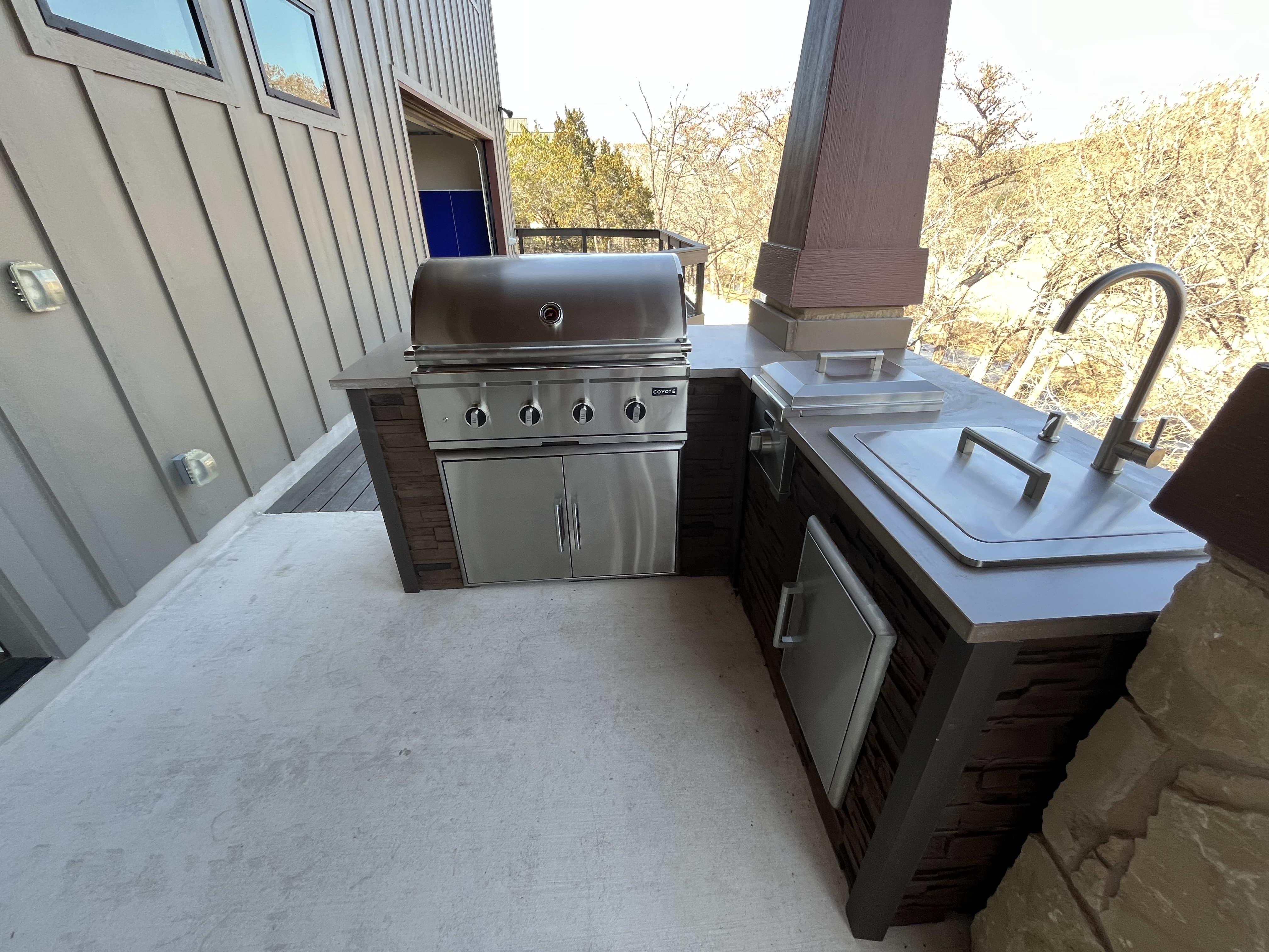 Coyote outdoor kitchen on a Hill Country deck